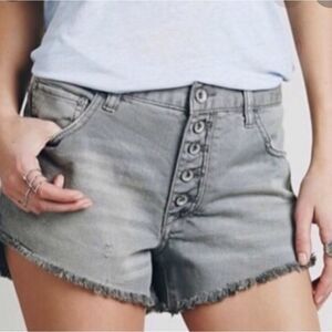 Free People Rugged Ripped Denim Shark Bite Shorts